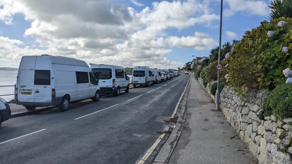 Vans parked on Cliff Road 