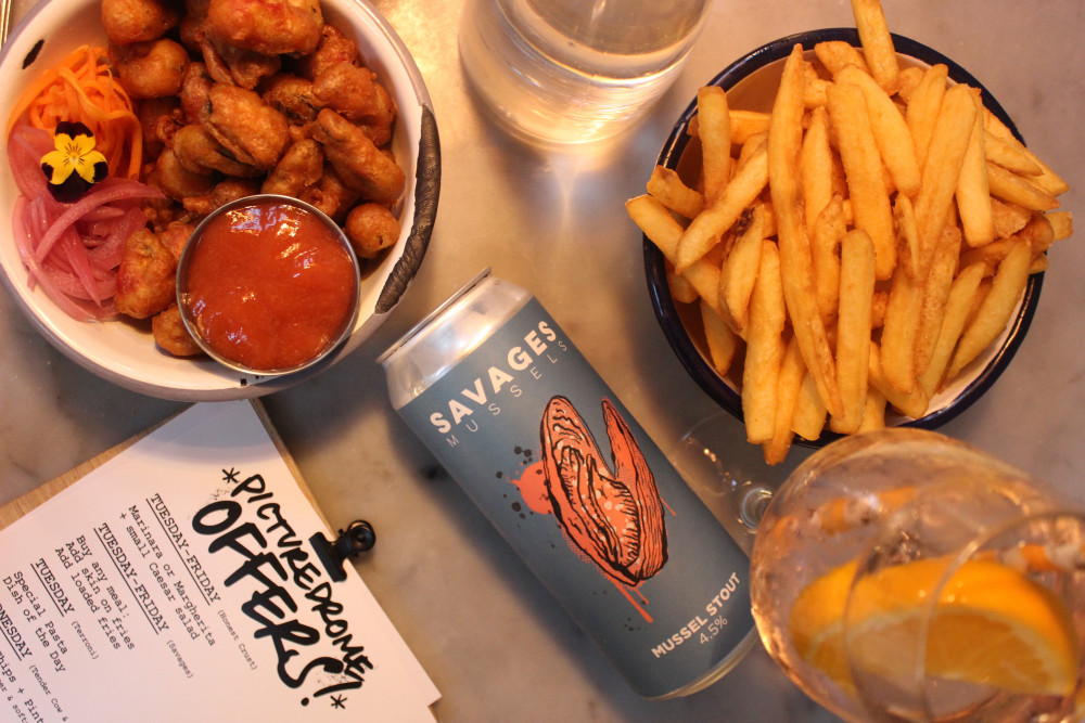 Popcorn mussels, fries and the mussel stout from SAVAGES Mussels at The Picturedrome Macclesfield. (Image - Alexander Greensmith / Macclesfield Nub News)