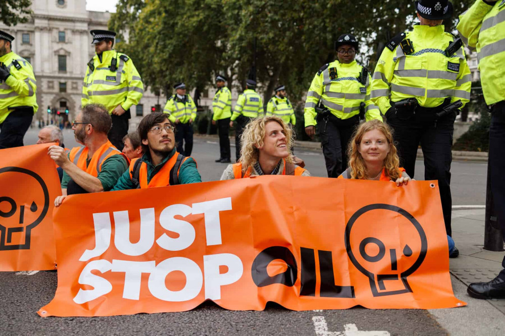 Falmouth residents involved in the Just Stop Oil blockage - from left to right, Tristain Herbert, Finn Halsall and Holly Astle (Image - Just Stop Oil).