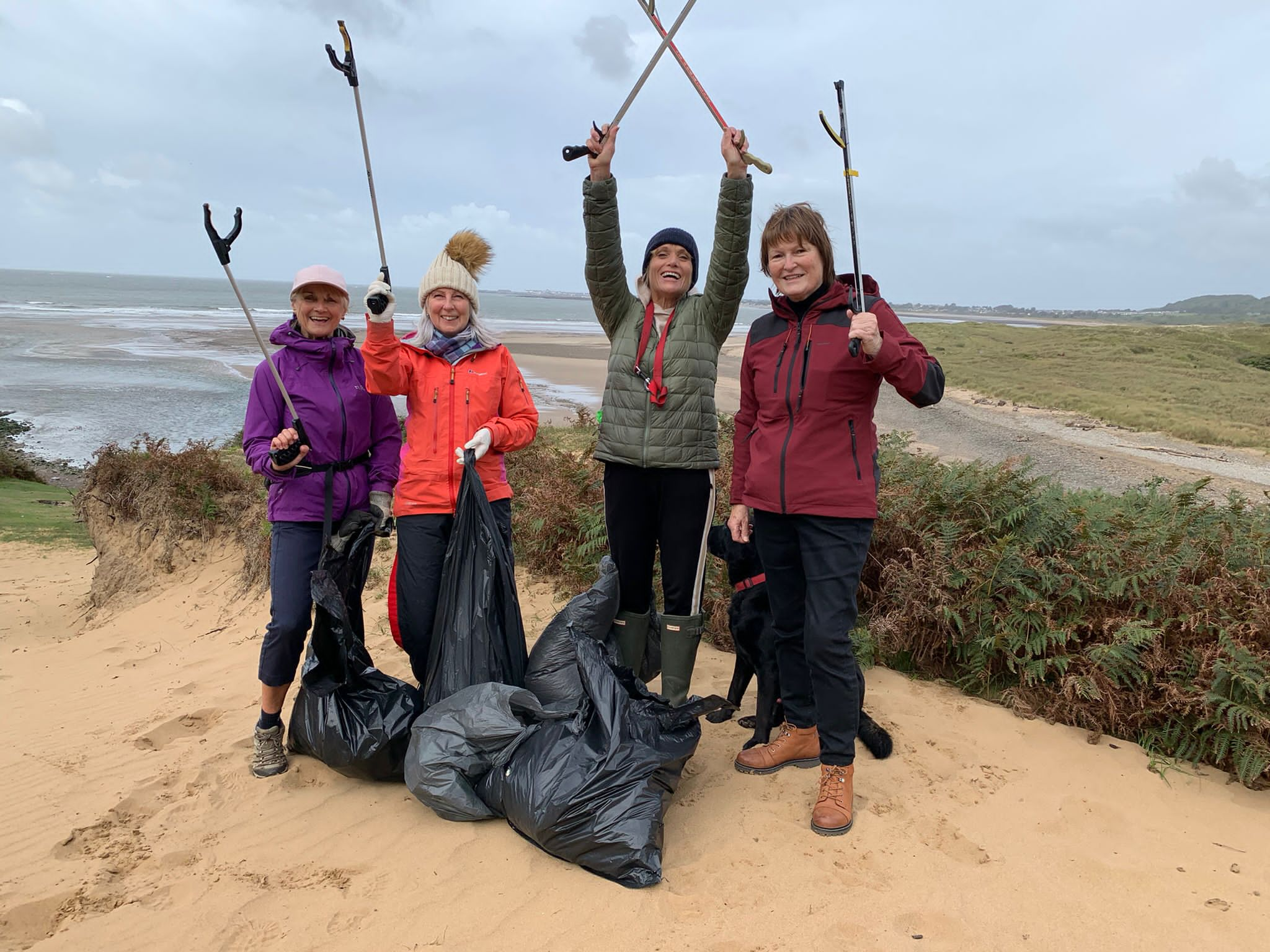 WI ladies cleaning up the estuary