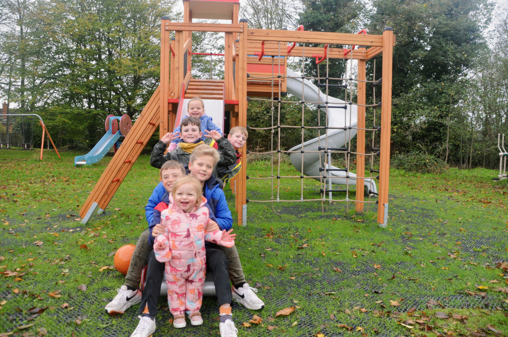 Kids of all ages enjoying new slide at Chelmondiston (©NubNews)