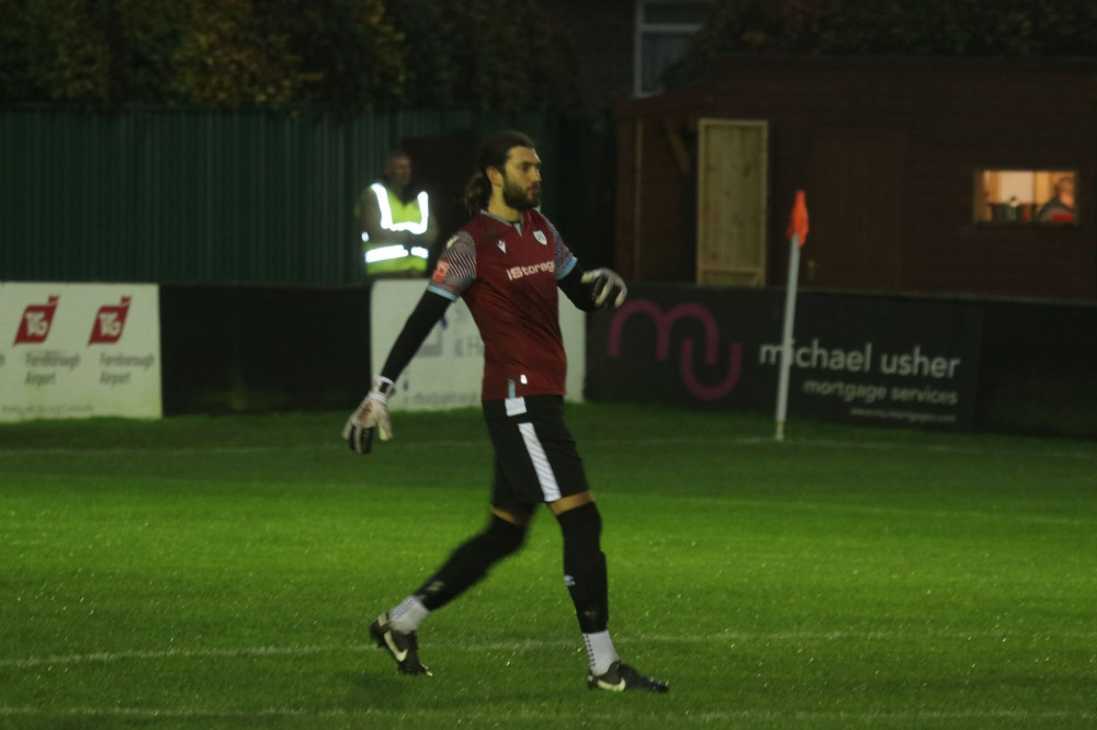 Midfielder George Nicholas went in goal as Hanwell lost against Hartley Wintney. Photo: Hanwell Town.