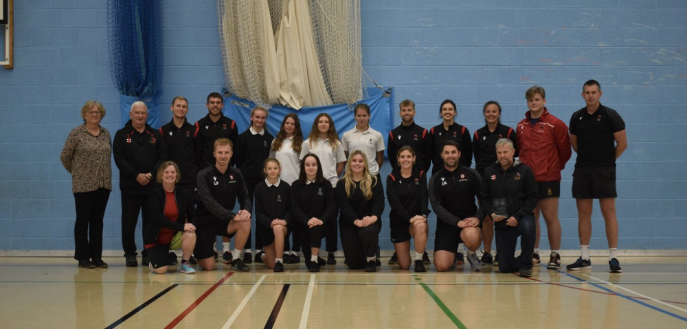 Penryn College's staff and students with Cornwall Cricket representatives.