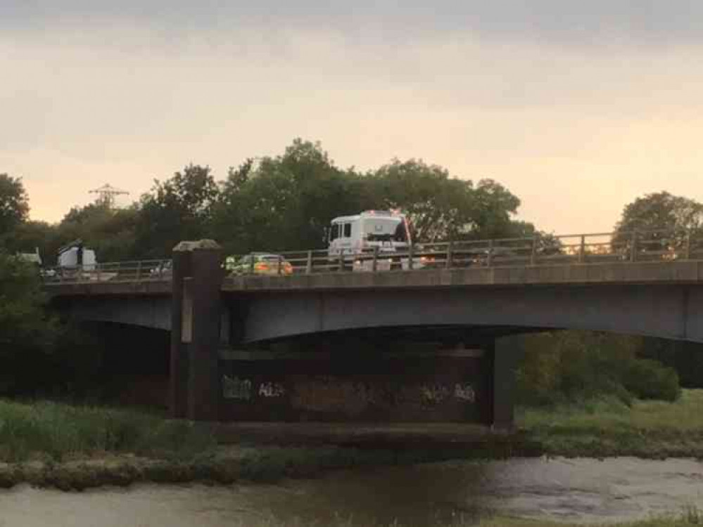 Police and recovery vehicles remain at the scene on Maldon bypass, close to the bridge over the River Chelmer