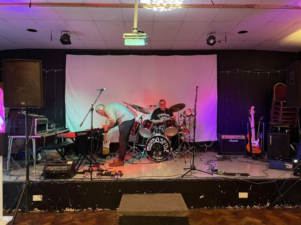 Rod Oakley behind the drums as his band prepared for last night's successful gig. 