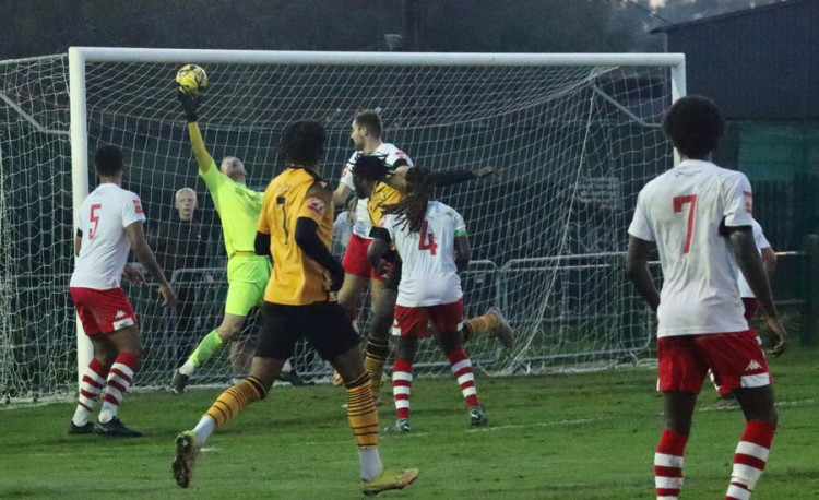 Keeper Tommy Dixon-Hodge saves this Brian Moses second half header. Picture by Vic Evans.