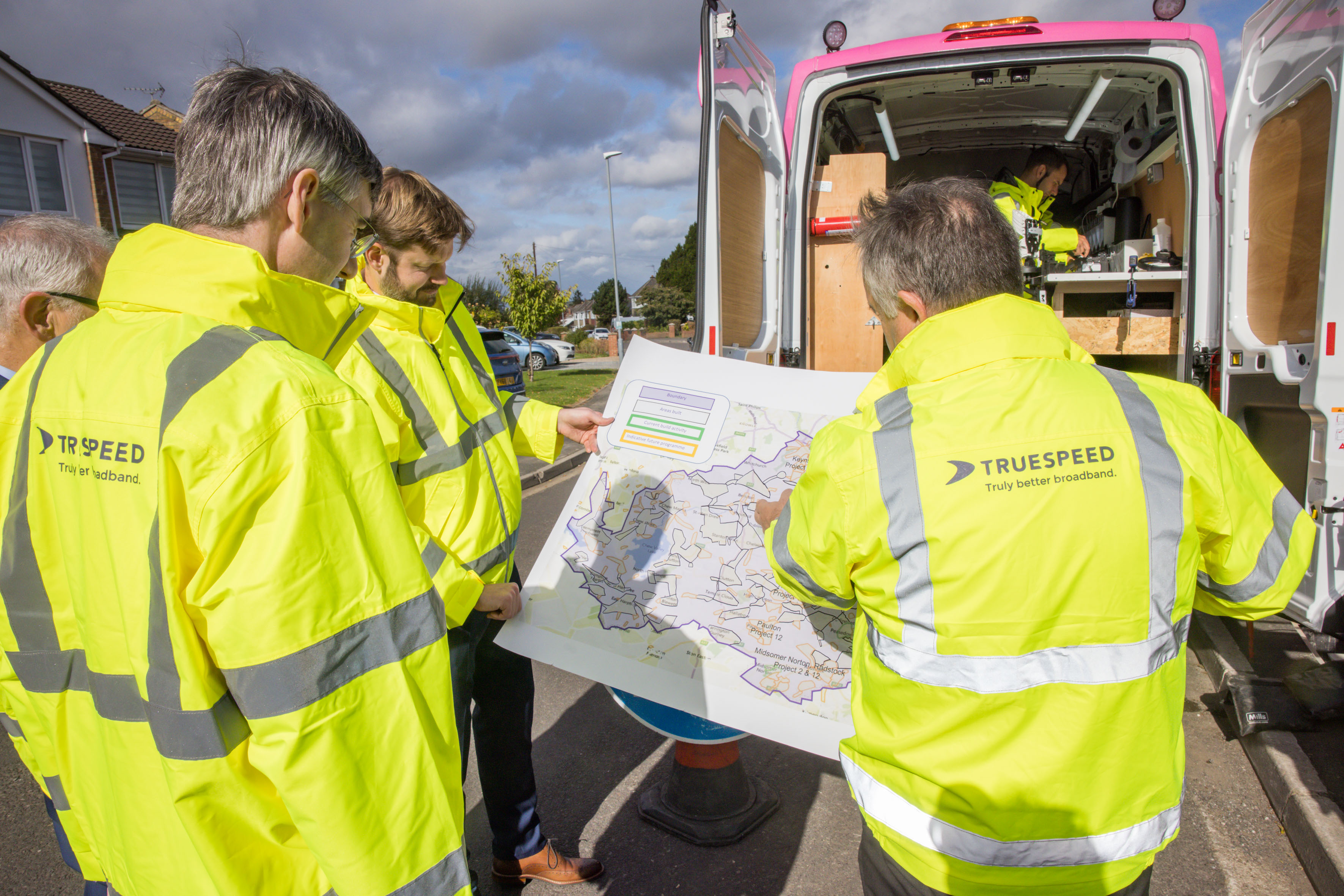 Jacob Rees-Mogg and Truespeed team members discussing building plans including Midsomer Norton rollout