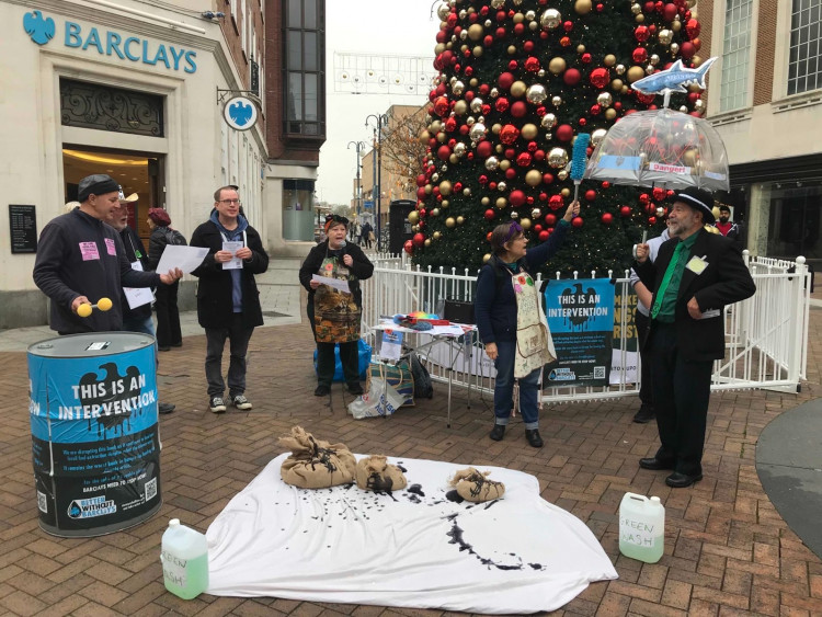 Extinction Rebellion protestors outside Kingston's Barclays bank on Monday morning.