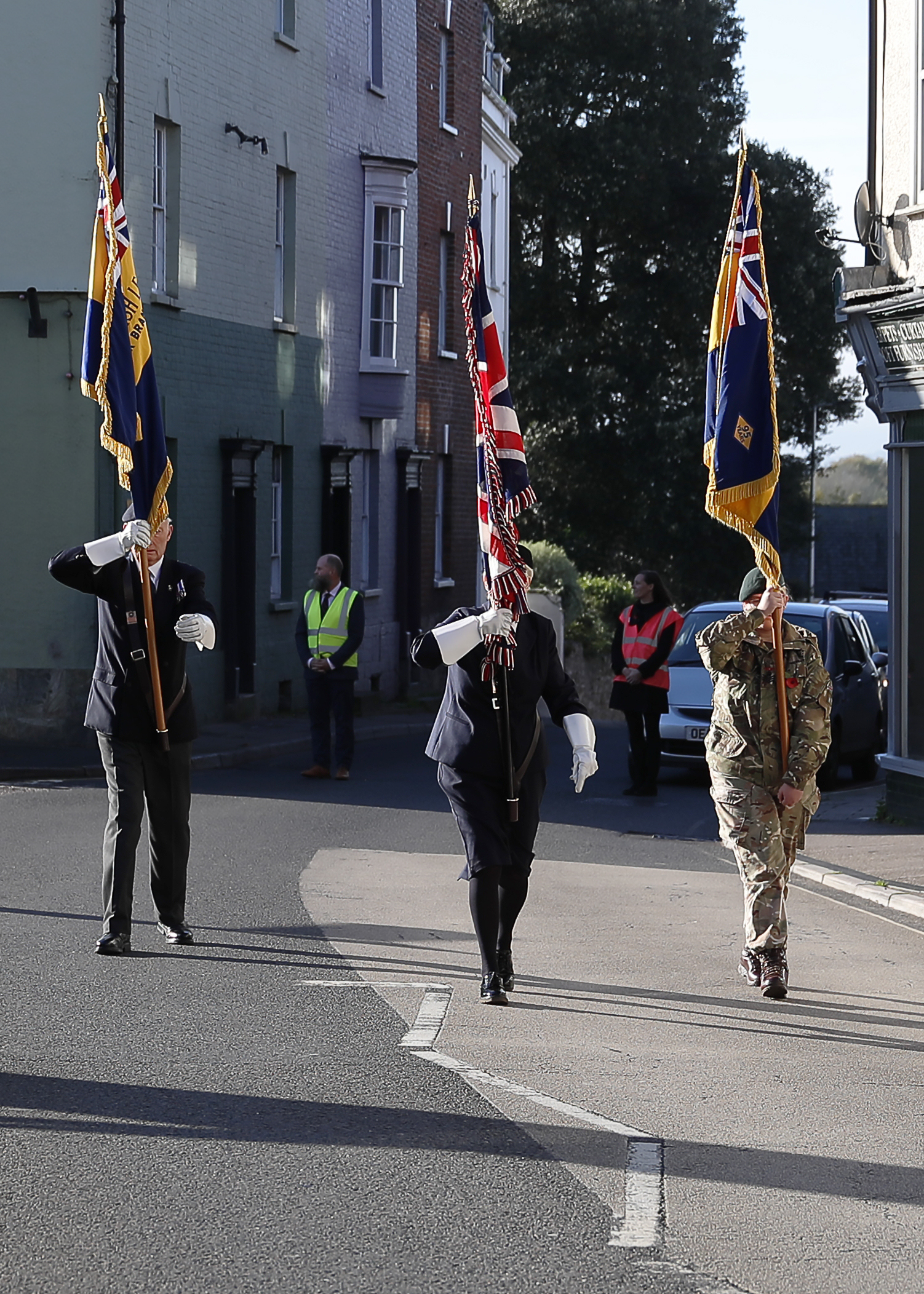 The Standard Bearers lead the Axminster remembrance parade