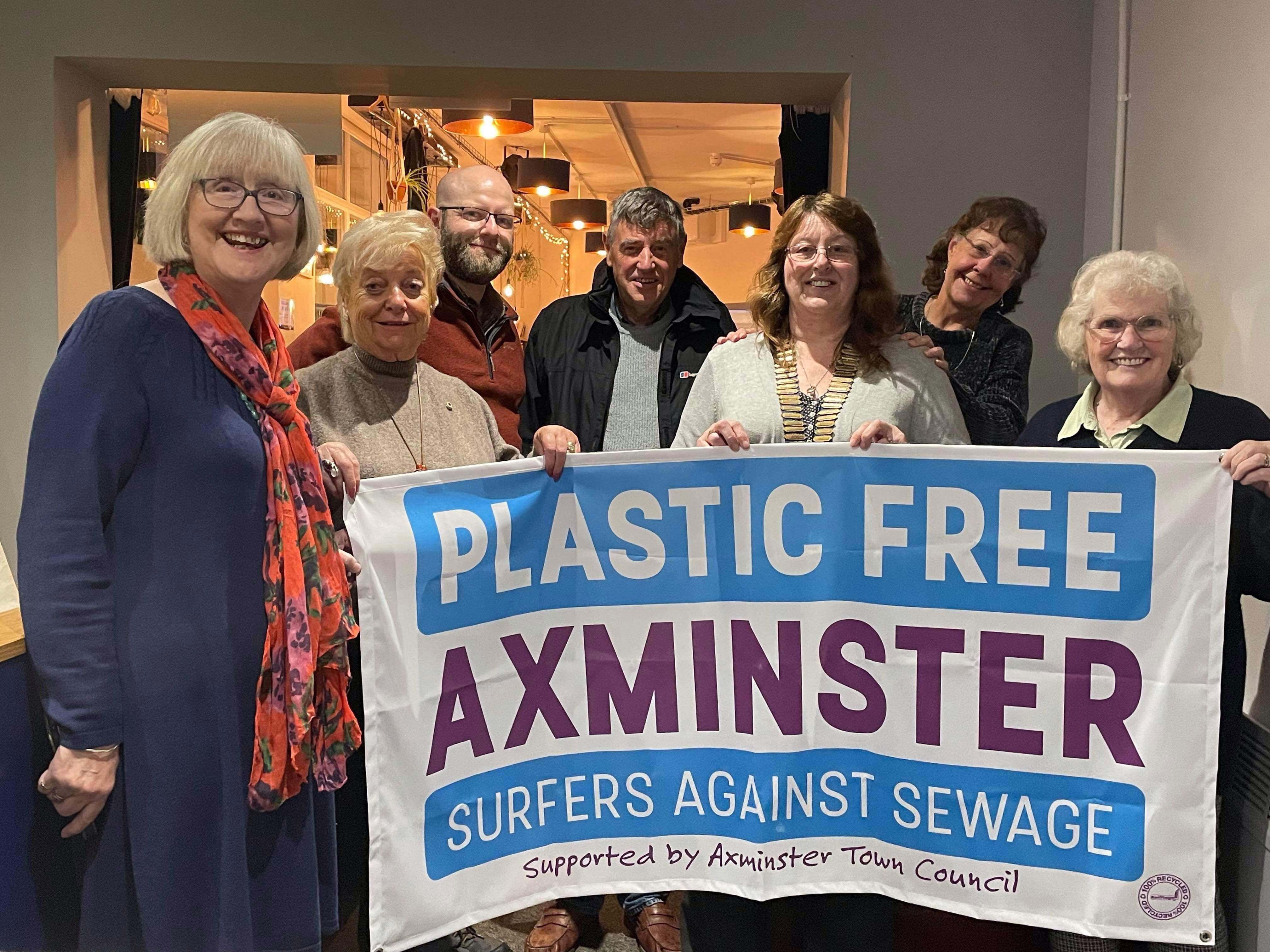 Axminster Lions Club committee members Cindy Ellis, Beverley Love and Kathy Branson with members of Plastic Free Axminster