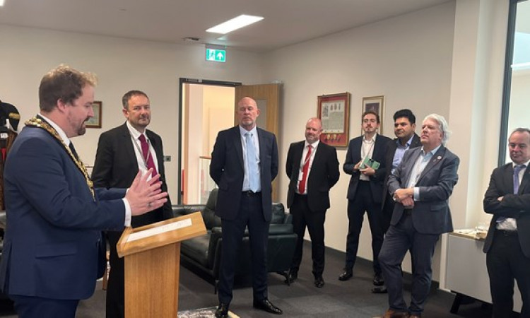 Cllr James Halden, Mayor of Thurrock, addresses business visitors to his parlour. 