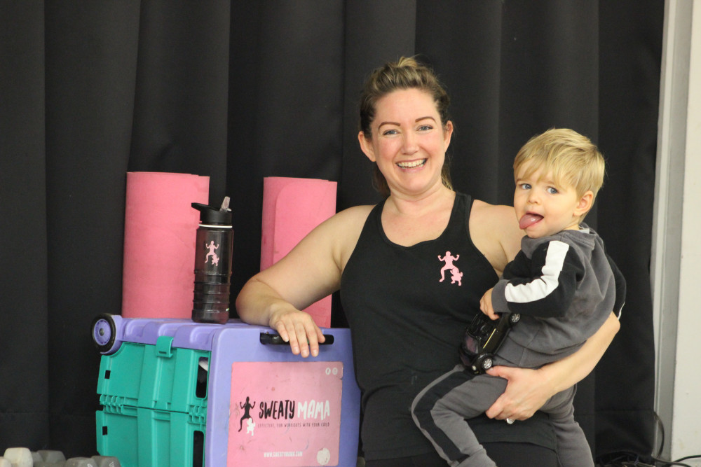 Aimee Croke is celebrating two years running baby and mum exercise group Sweaty Mama Macclesfield. Her she is pictured with her toddler Axel. (Image - Alexander Greensmith / Macclesfield Nub News)