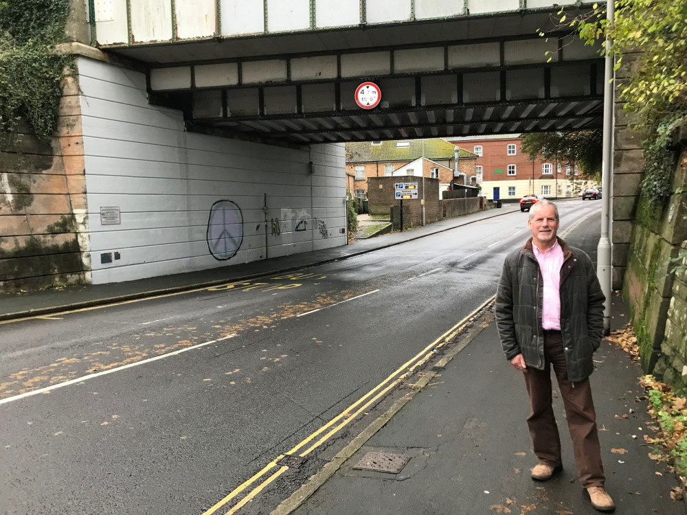 Cllr Les Fry at the Damers Road rail bridge