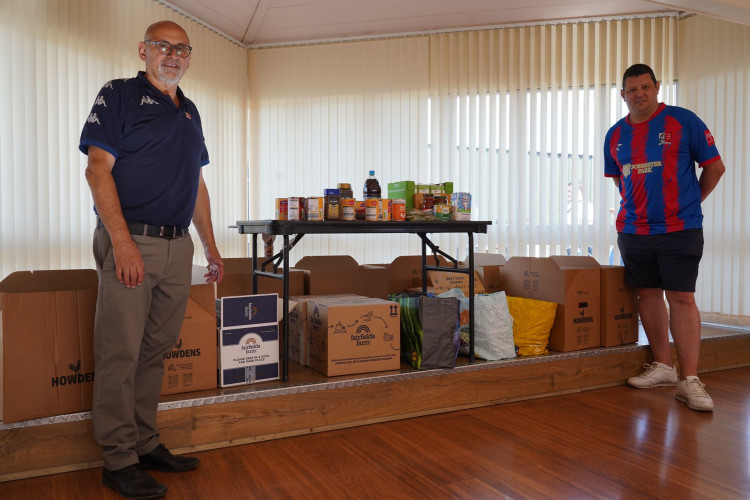 Maldon & Tiptree FC Chairman, Jerry Carter, with Tony Williams, Chair of the Jammers Fans Association, pictured at the foodbank collection in August.