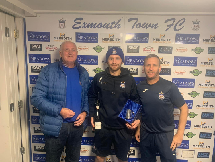 Arron Denny, centre, being presented Man of the Match and an award for his 200th appearance (Exmouth Town FC)