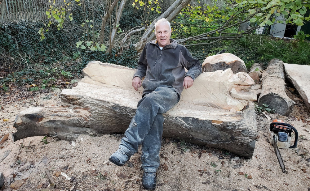 Graham Jones was in Packmore's Community Garden last Saturday demonstrating his wood carving skills (Image by Geoff Ousbey)