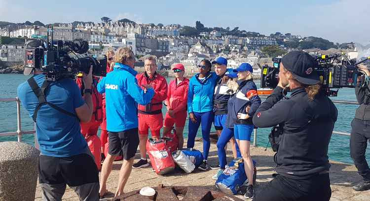 Charlie Pitcher briefing celebrities in St Ives