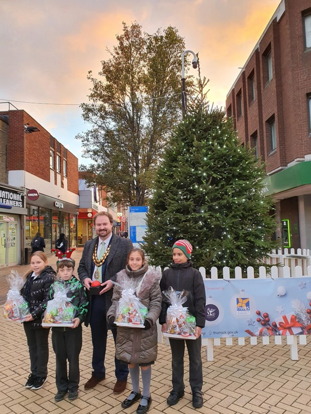 Cllr James Halden and youngsters from Quarry Hill switched on the Grays Christmas lights