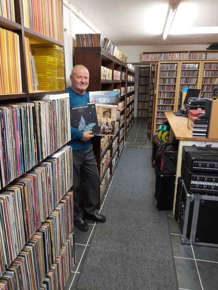 Radio presenter Kevin Briggs with part of his collection of 265,000 singles and albums, housed in a purpose-built extension to his Maldon home