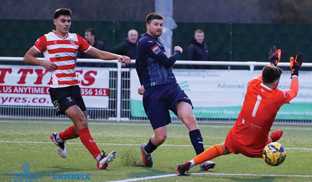 This Aveley effort by George Sykes, captured by photographer Kevin Lamb (Lambpix) looked goalbound but on a day of frustration for the Millers it failed to break the deadlock. 