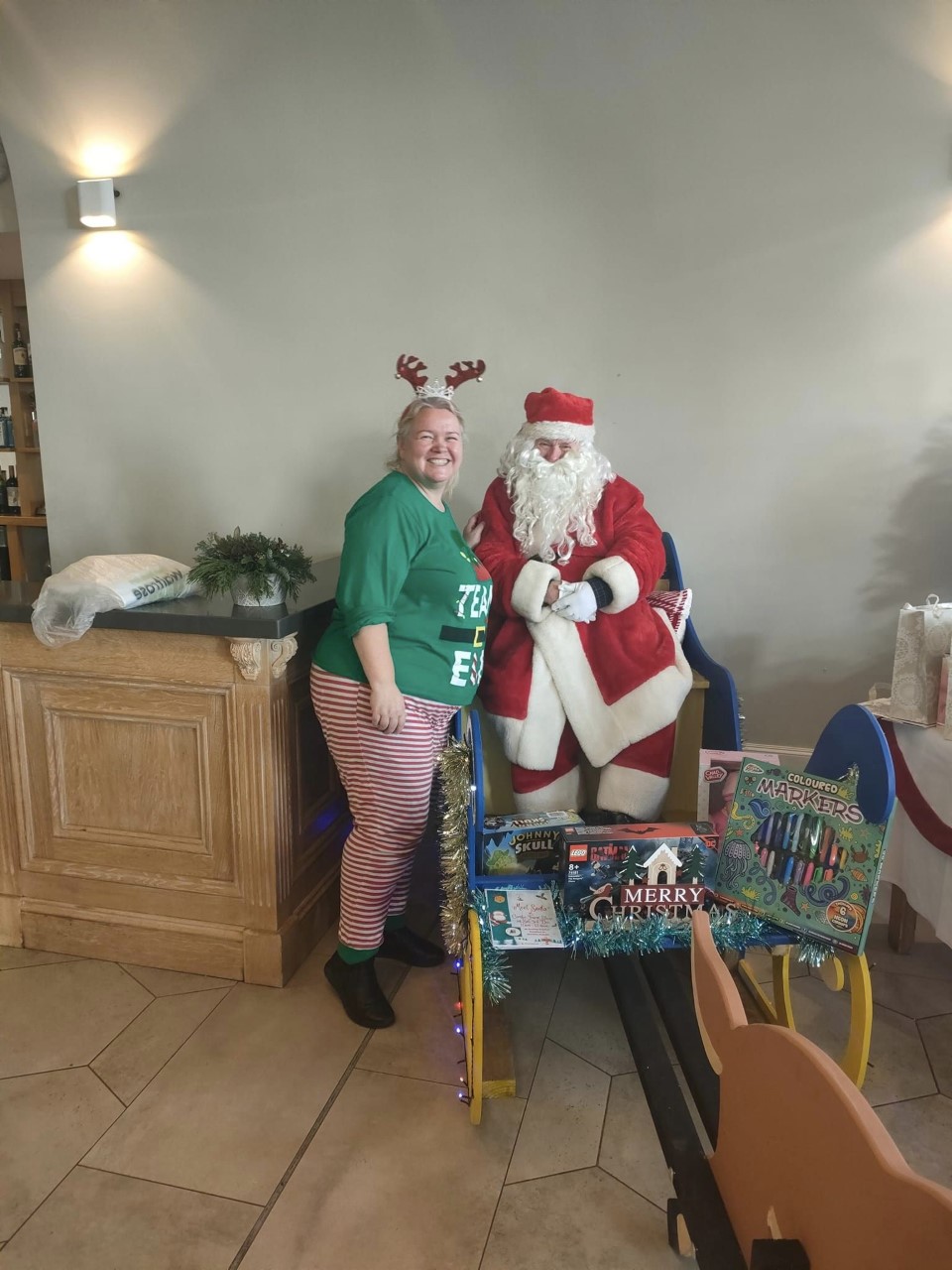 Sharon Thorne and Santa (Credit: Caroline Retter)