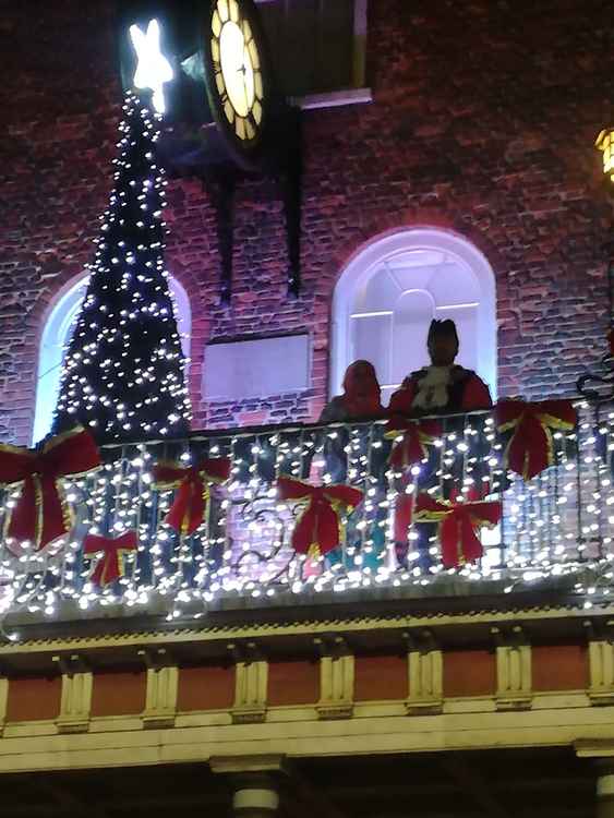 Mayor Jhual Abdul Hafiz and his wife Mayoress Shamema Begum switch on the lights from the Moot Hall balcony