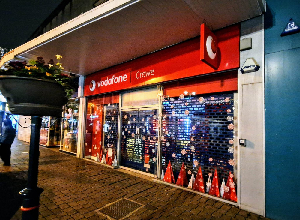 Two unknown men entered Crewe Vodafone, Market Street and removed three mobile phones from a display stand (Ryan Parker).