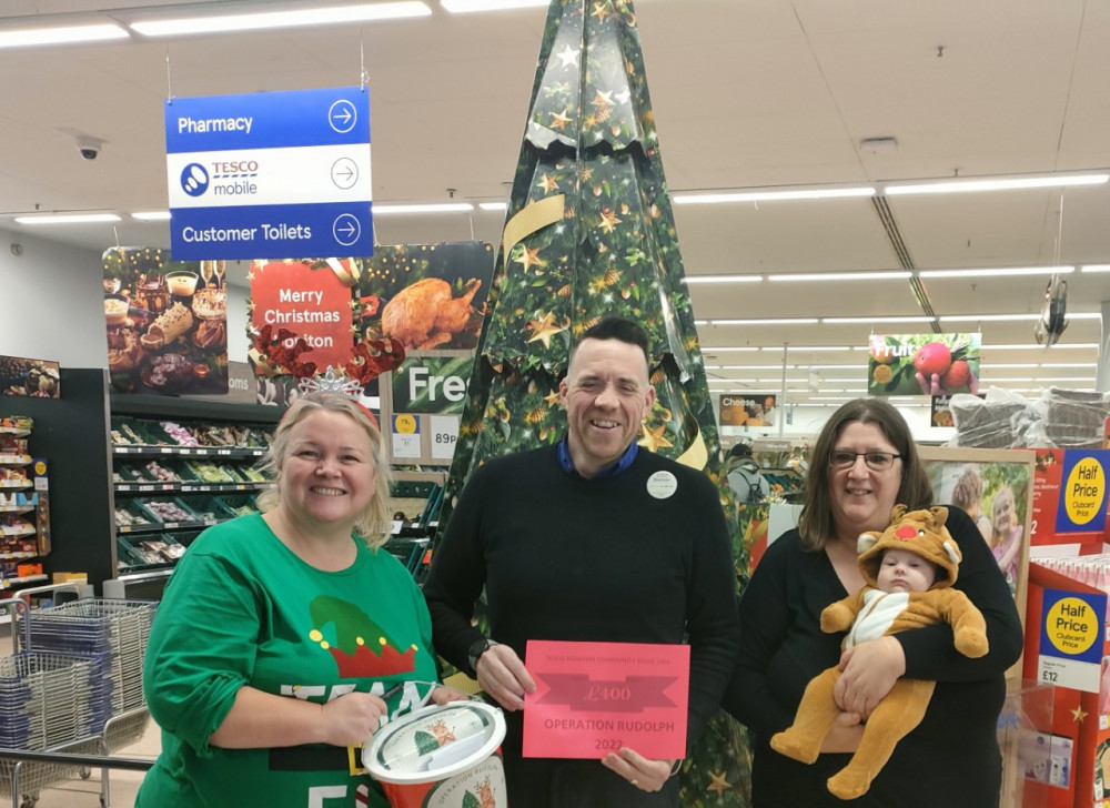 Sharon Thorne (L), Duncan Sheridan-Shaw and Caroline Retter receive the donation from Tesco. (Photo credit: Caroline Retter)