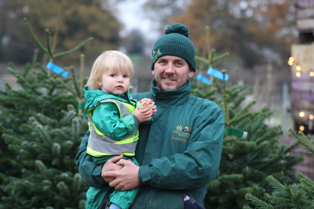 You'll be able to enjoy Christmas refreshments as you choose your tree at Libby's Patch. Image: Daniel Thornicroft with son Rupert. (Alexander Greensmith / Congleton Nub News)
