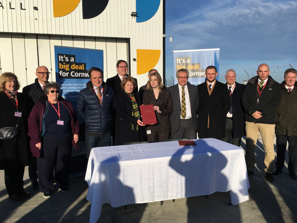 Cornwall Council leader Linda Taylor, Cornwall Council Cabinet members, MP Steve Double and Levelling Up Minister Dehanna Davison at the signing of the Cornwall Devolution deal at Spaceport Cornwall (Image: Richard Whitehouse)