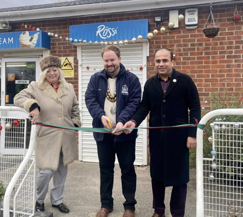 Cllr Halden cuts the opening ribbon.