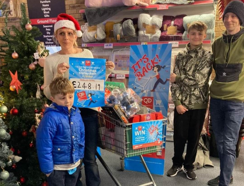 Emma and family with their festive winnings (image courtesy of QD).