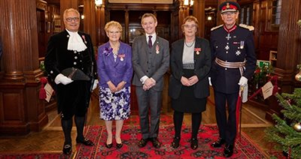 (Left to right - High Sheriff of Staffordshire, Mr Ben Robinson MBE, Sheila Cooper BEM, Daniel Kinsey BEM, Maureen Recine BEM, and Mr Ian Dudson CBE KStJ)