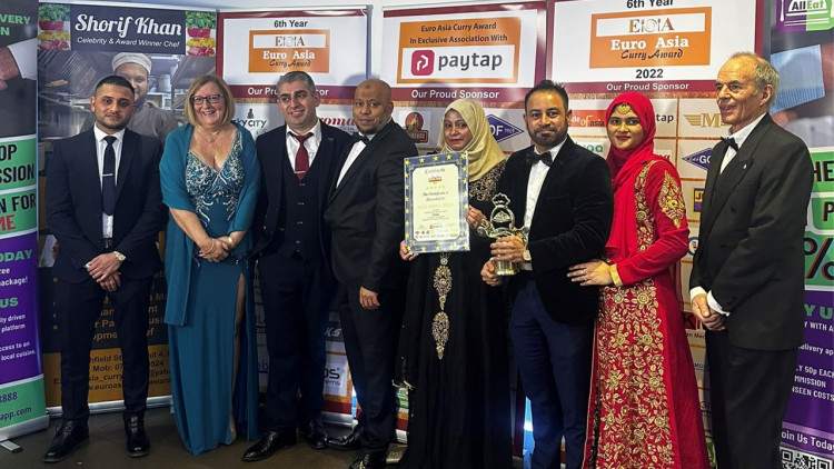 Councillor Jhual Hafiz (fourth from the left) celebrated with his wife, Shamema Begum (beside him) and friends.