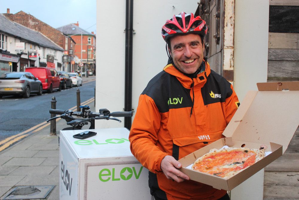 Russ Hope and his fleet of electric bike riders can now deliver pizza pies to your home. (Image - Alexander Greensmith / Macclesfield Nub News)