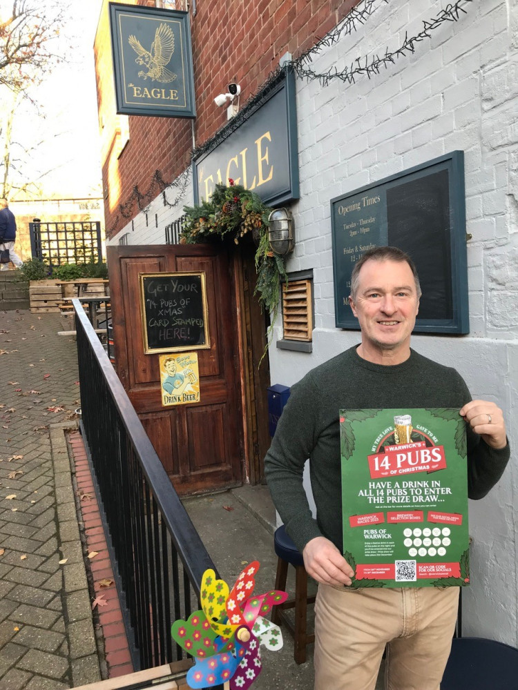 A brand new festive ale trail has been launched in Warwick, giving revellers an incentive to explore the town’s pubs and bars and win prizes while they’re at it. Pictured: Tim Maccabee, landlord at The Eagle, who co-organised the trail. Photo courtesy of EMPR.