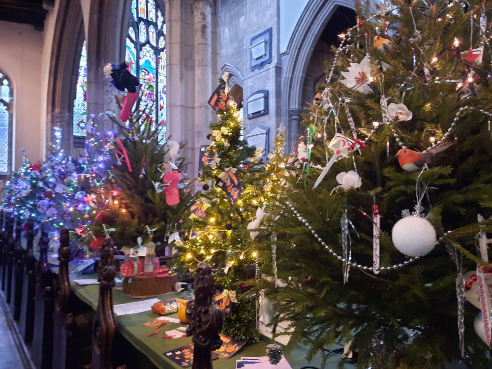 The trees were decorated by local businesses and charities.