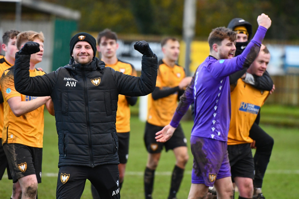 Andrew Westgarth and his players celebrate after 5-4 victory over Barnstaple 