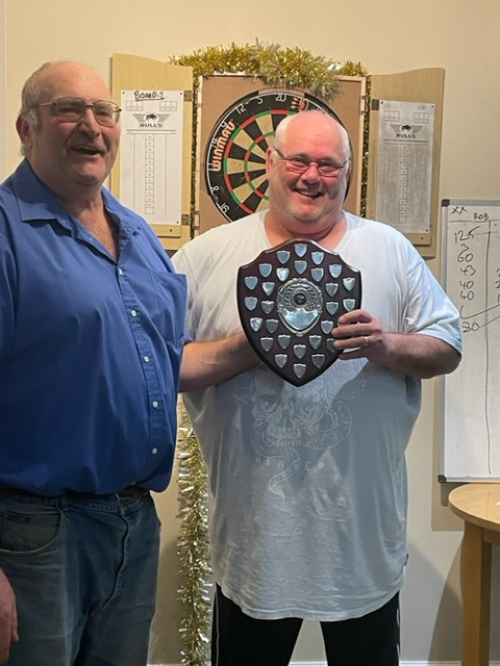 Ray Powell receives the Christmas Darts Shield