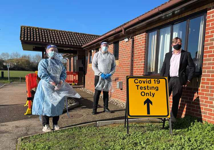 Maldon MP John Whittingdale (right) takes a test at West Maldon Community Centre