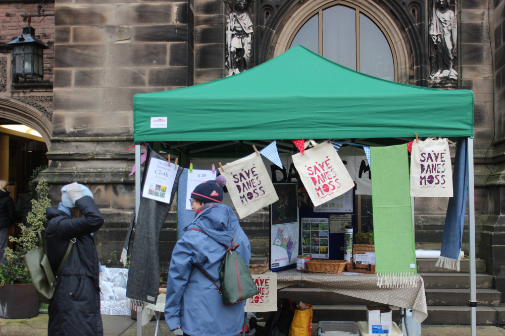 The 'SAVE DANES MOSS' campaign outside St. Michael's Church in Macclesfield. (Image - Macclesfield Nub News)