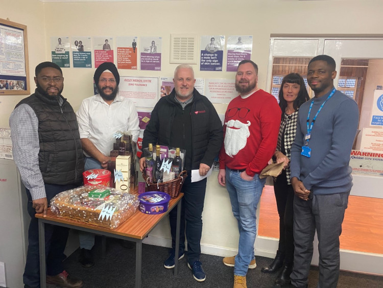 Steve Stuart, third from left, with doctors and staff at Aveley Medical Centre. 