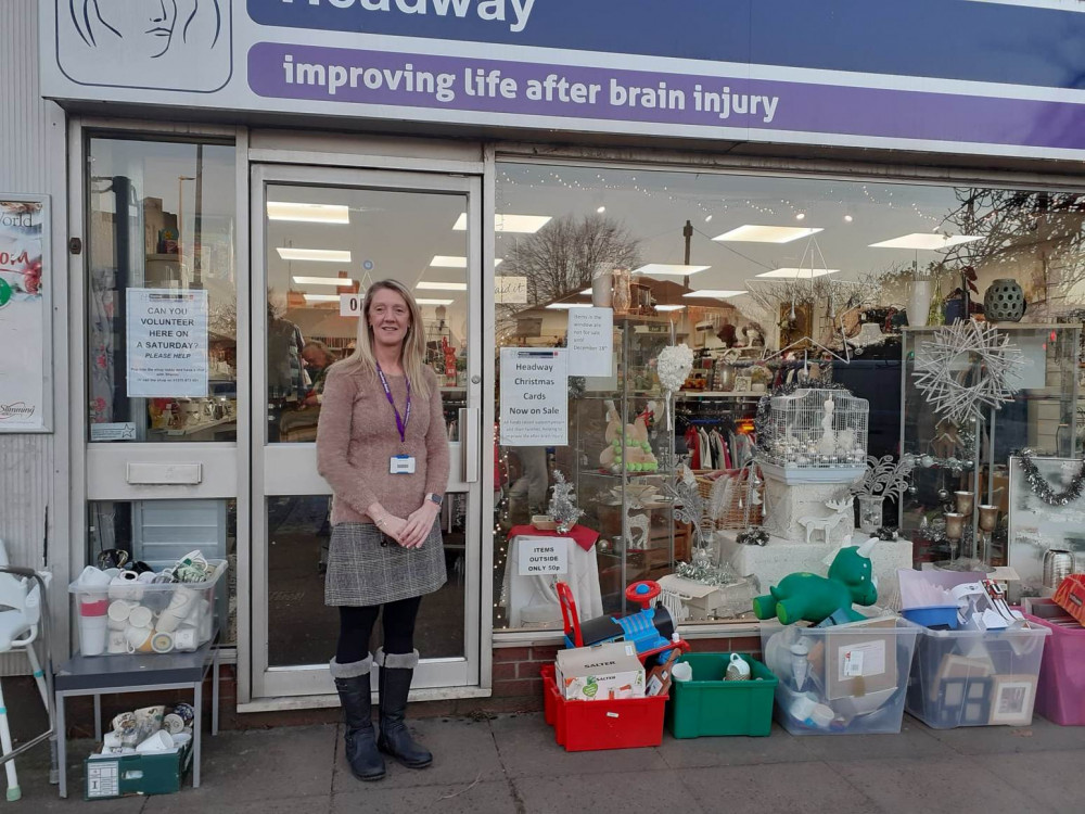 Sharon outside the Alsager charity shop.