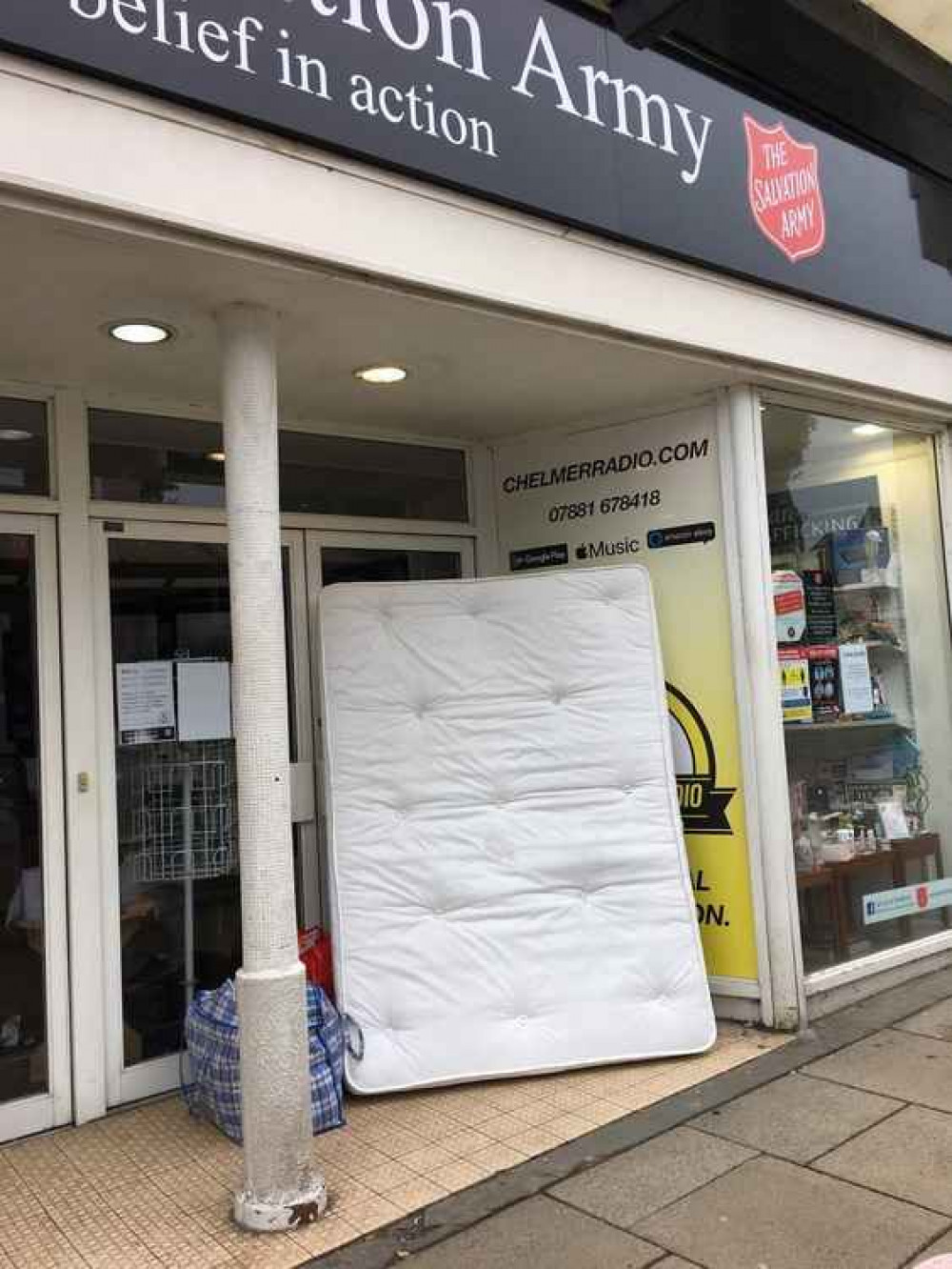 The mattress was left propped up outside the charity shop, which is closed during lockdown