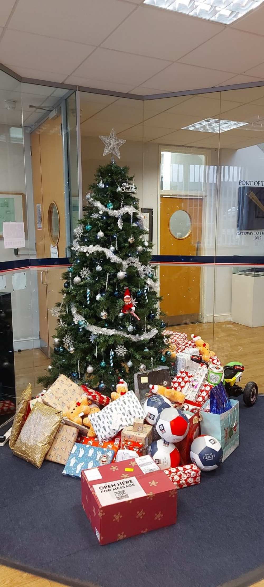 Presents under the tree at the Port of Tilbury’s port office before they were delivered to Changing Pathways.