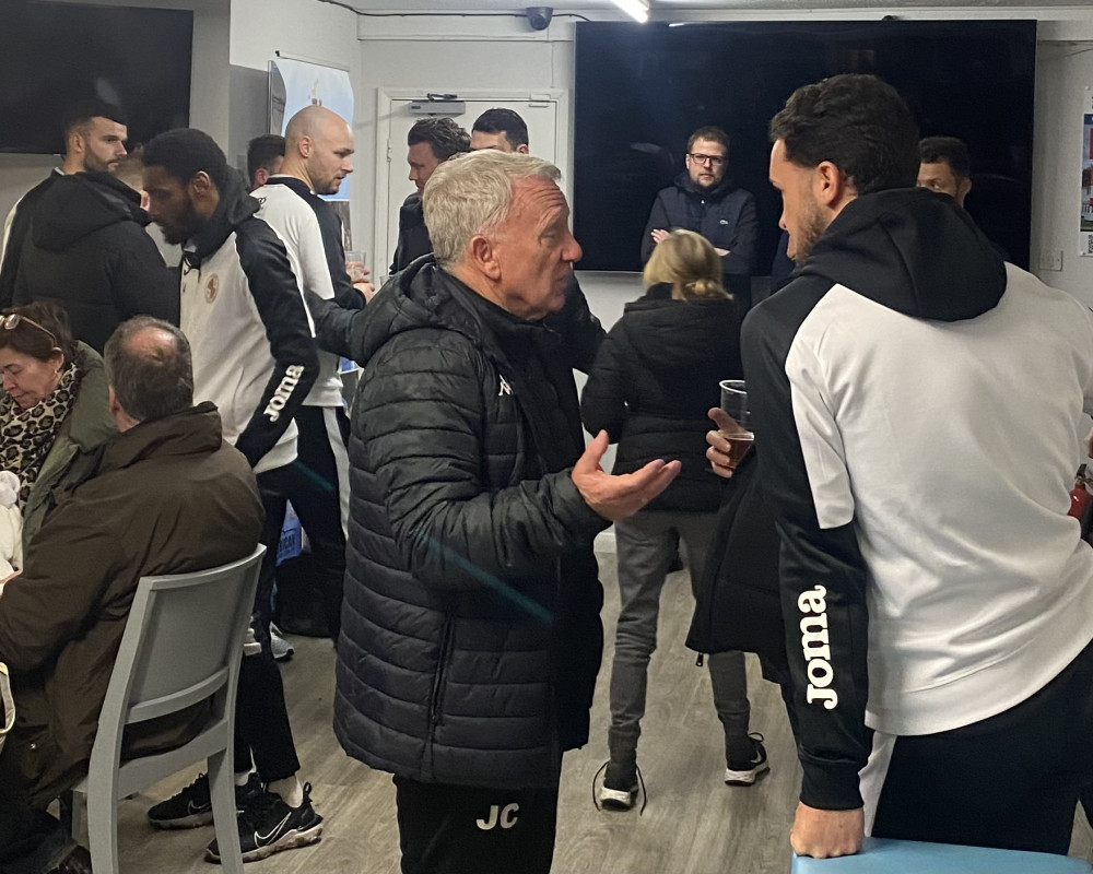 John Coventry in discussion with players after the match. 