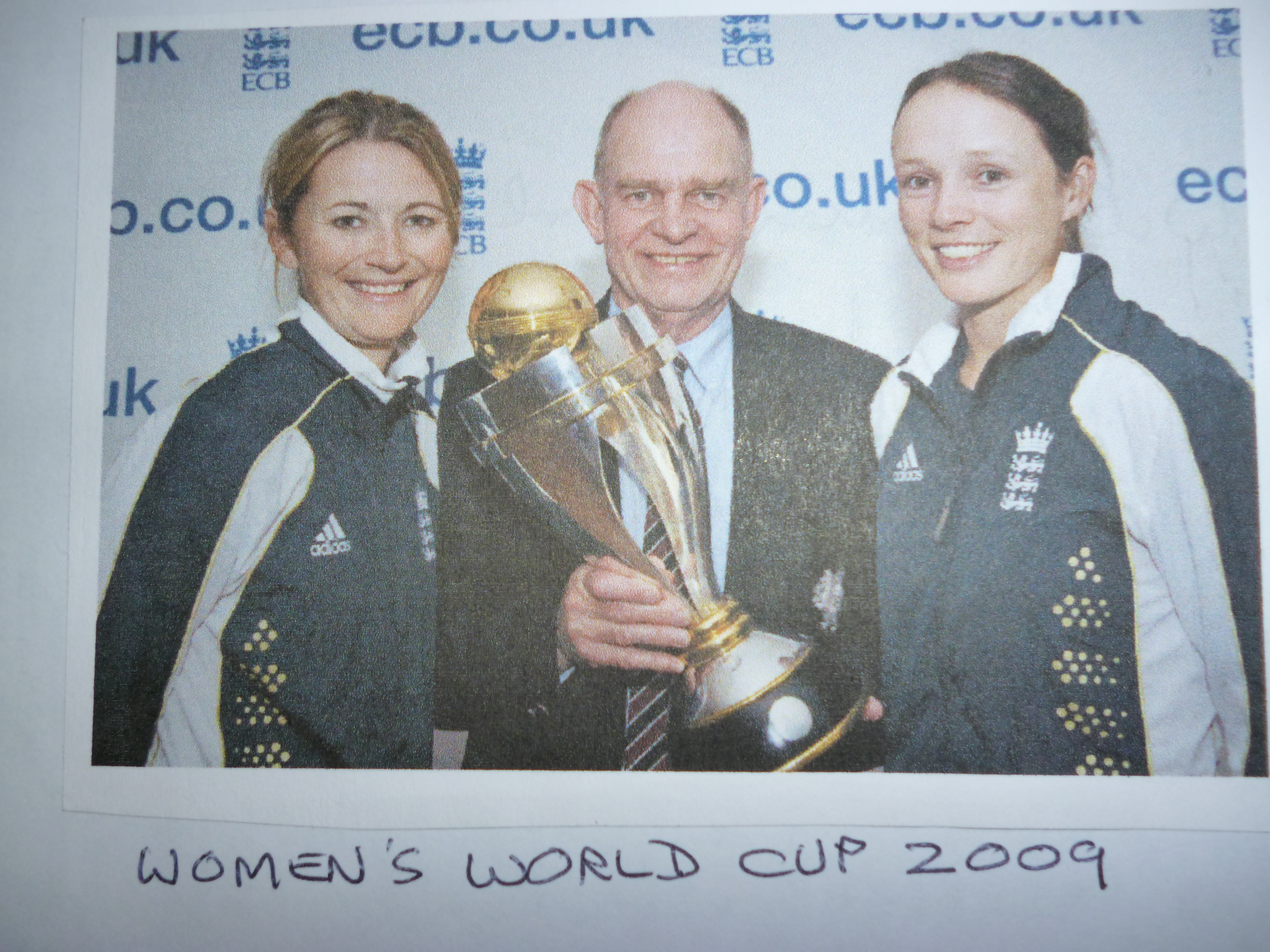 Charlotte Edwards and Caroline Atkins together with the Women's World Cup when England beat New Zealand in 2009