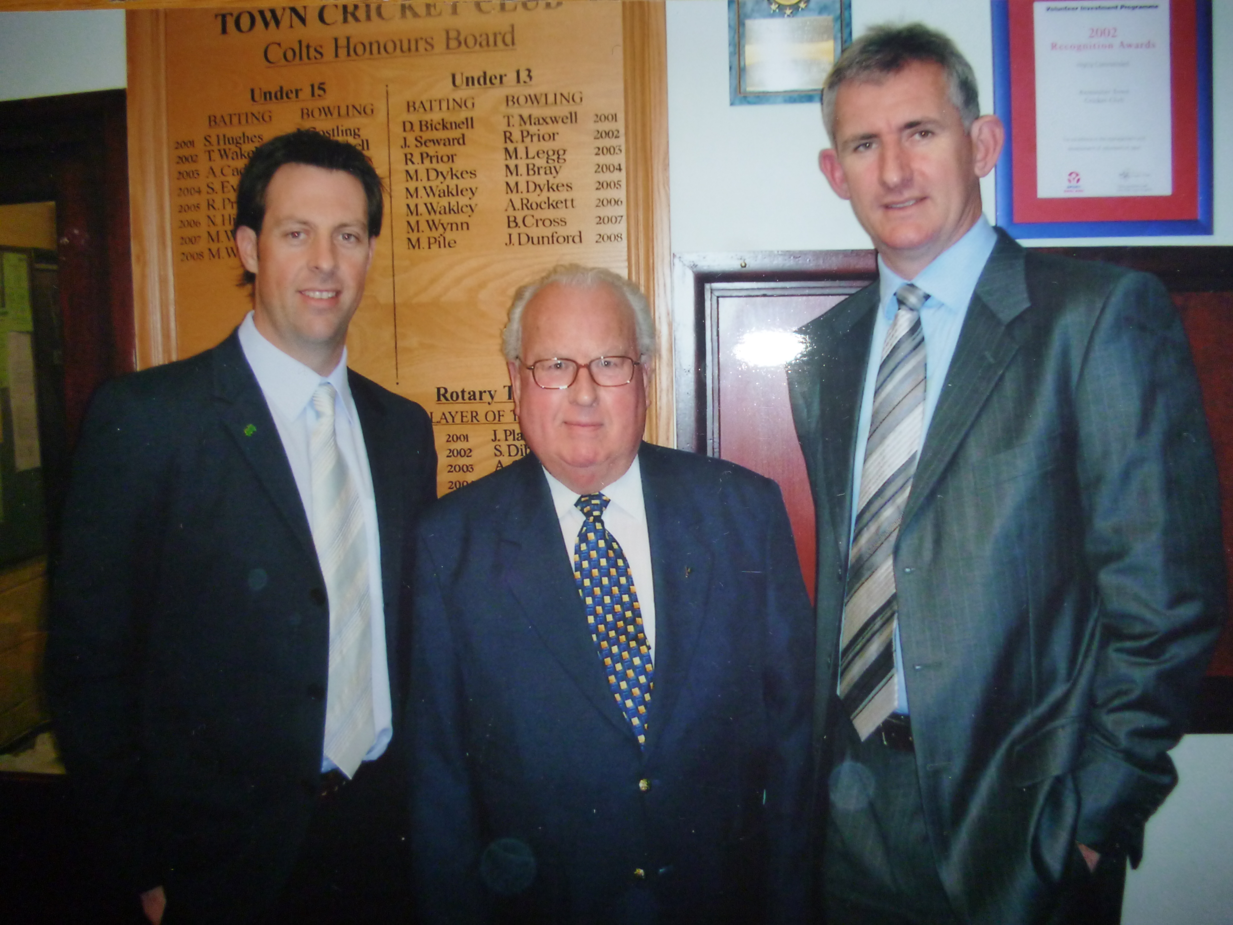 President of Axminster Town Cricket Club Les Haynes pictured with Marcus Trescothickl and Andrew Caddick