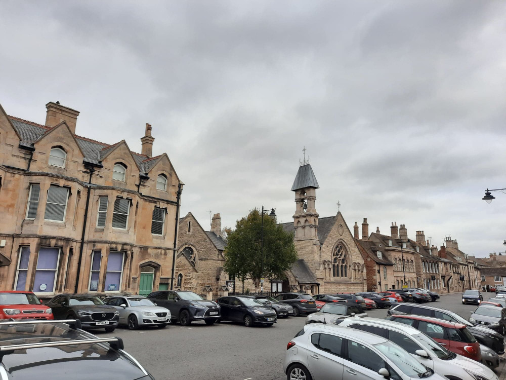 Stamford Historic Market Town busy with parked cars.