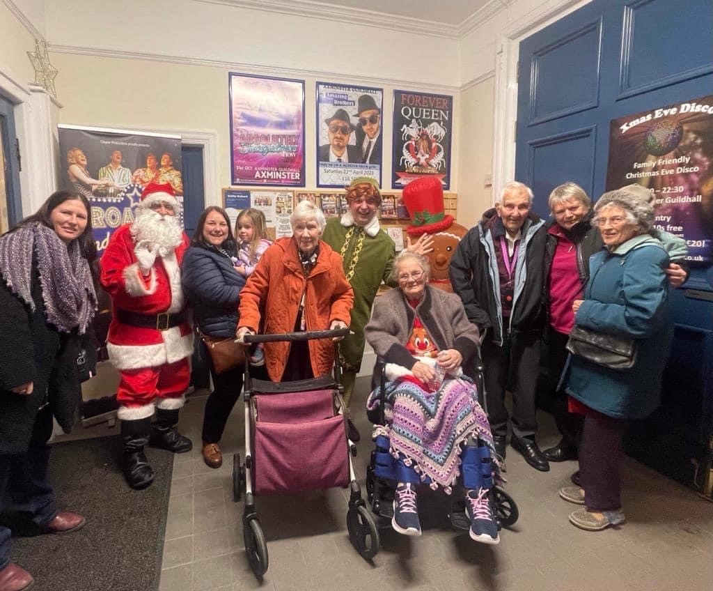 Dove Court staff and residents watching Elf the Musical (Doveleigh Care)